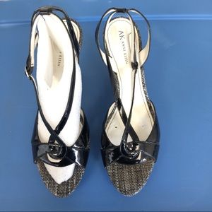 Black patent leather sling back wedges